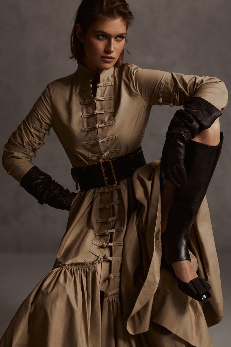 Mid Length Belted Dress in Beige Cotton Gabardine, £3,500.00, Saddle Belt in Black Smooth Calfskin and Technical Fabric, £1,550.00, Ornamental Long Gloves In Black Lambskin, £1,450.00, Dior Epique Gaiter in Black Calfskin, £1,150.00, Dior Idylle Ballet Pump in Black Patent Calfskin and Grosgrain, £790.00 All by Dior. Photo: Elizabeth Gibson