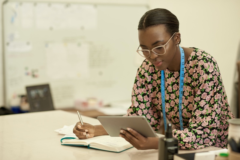 Black Woman Using Tablet