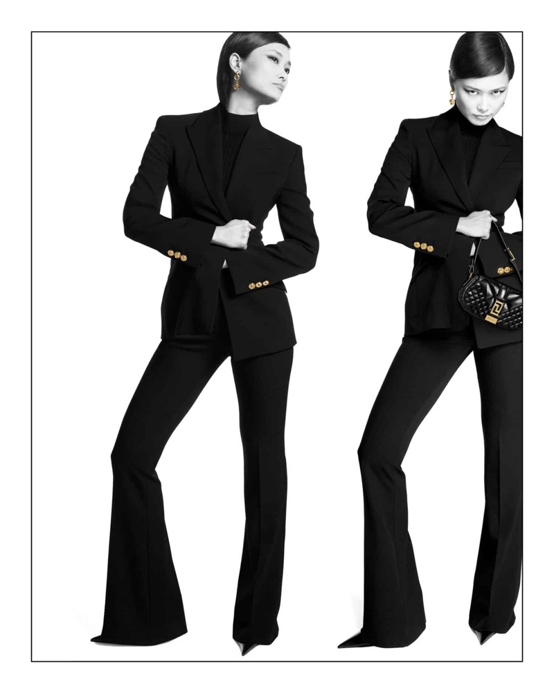 Chris Lee brings power and sophistication in a flared trouser suit for the Versace Icons campaign.