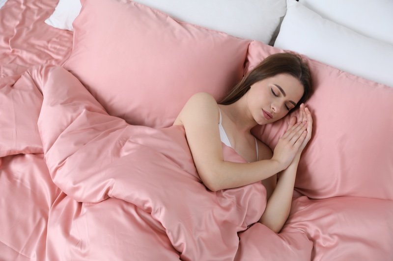 Pink Sheets Sleeping Bed