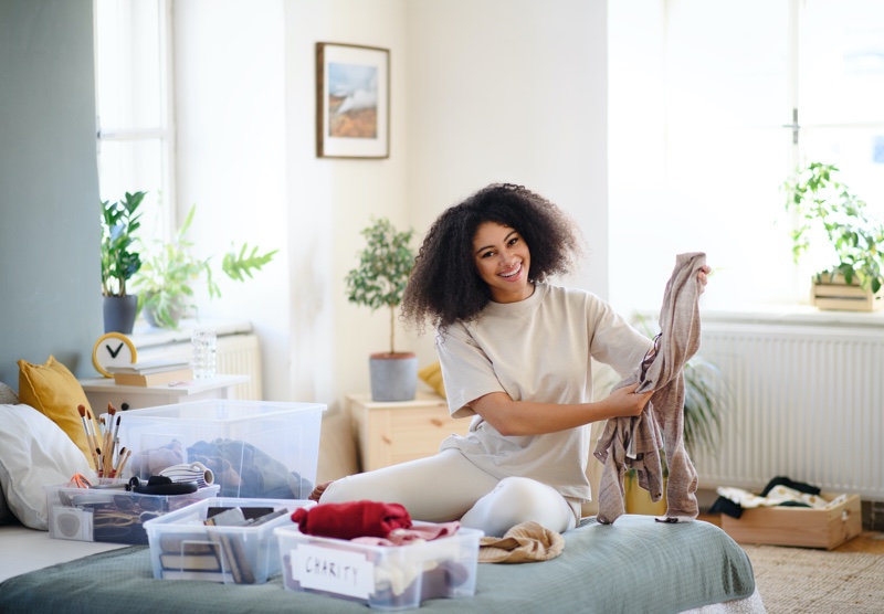 Woman Donate Clothing