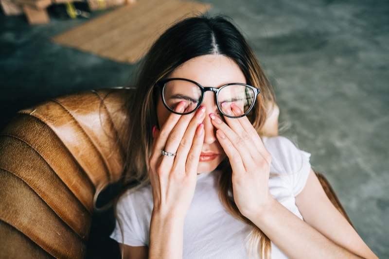 Woman Rubbing Dry Eyes