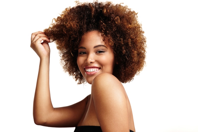 Woman Touching Afro Hair