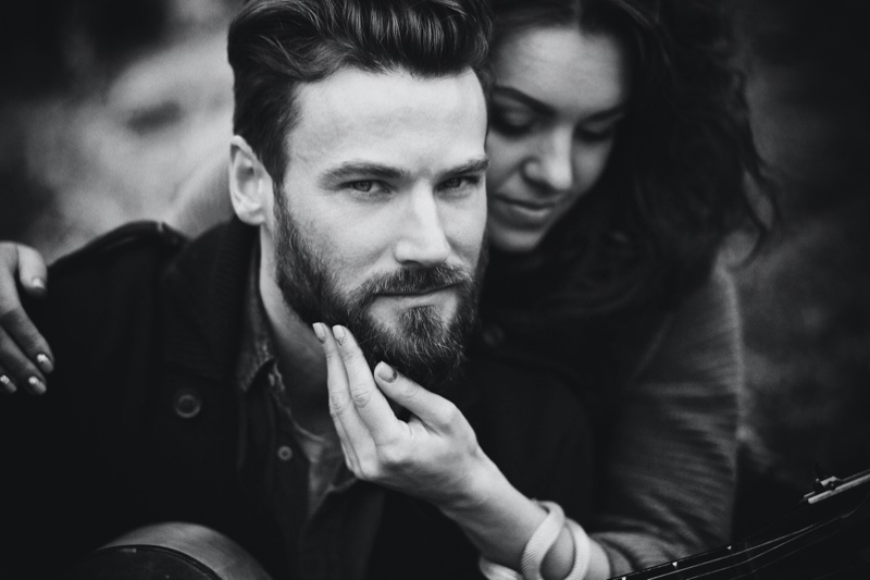 Woman Touching Man's Beard