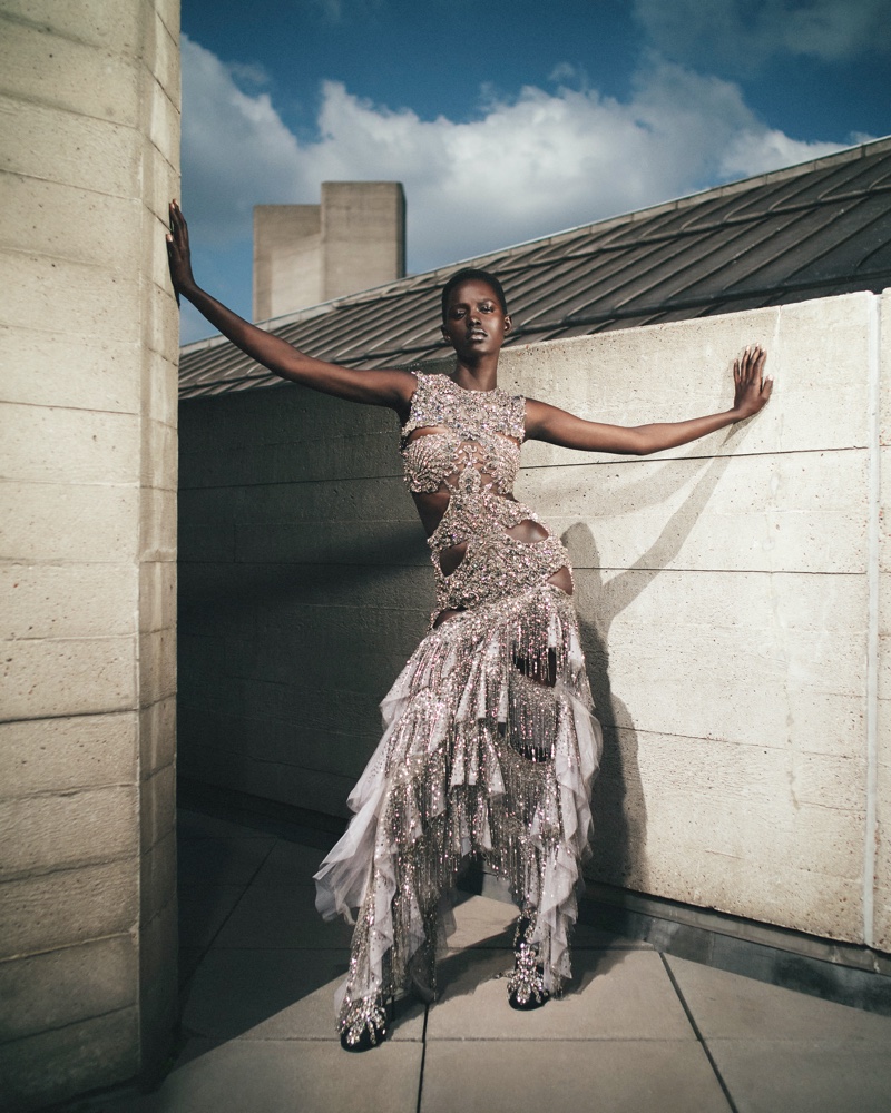 Adhel Bol models crystal-embellished ensemble for Alexander McQueen pre-fall 2023 campaign.
