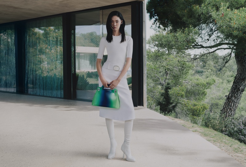 Silja Kang poses with the Wanda bag for Ferragamo's elegant pre-fall 2023 campaign.