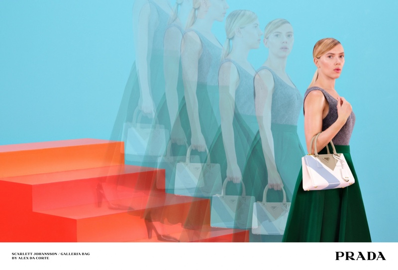 Scarlett Johansson radiates retro glamour with Prada's Galleria handbag in vibrant colors.