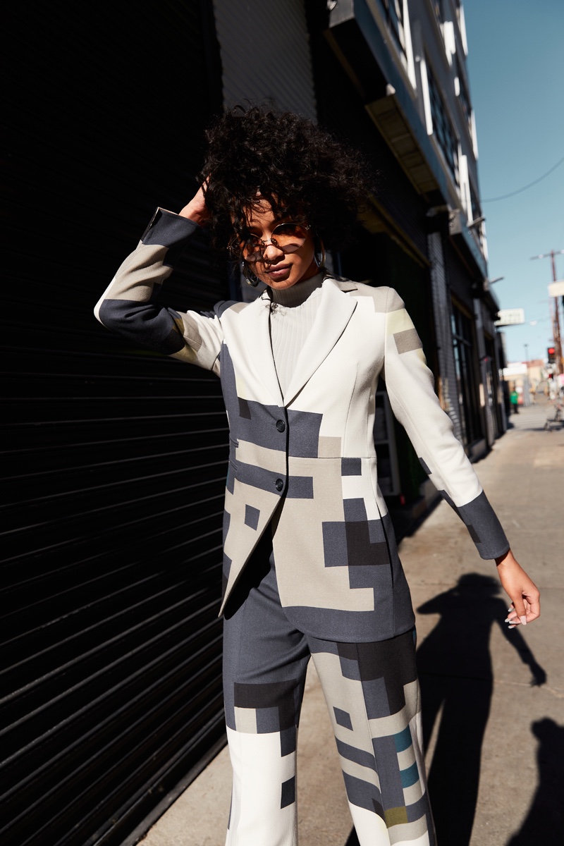 Cydney Christine wears Suit Akris, Top Akris, Earrings Cult Gaia & Sunglasses Victoria Beckham. Photo: Alexander Ting