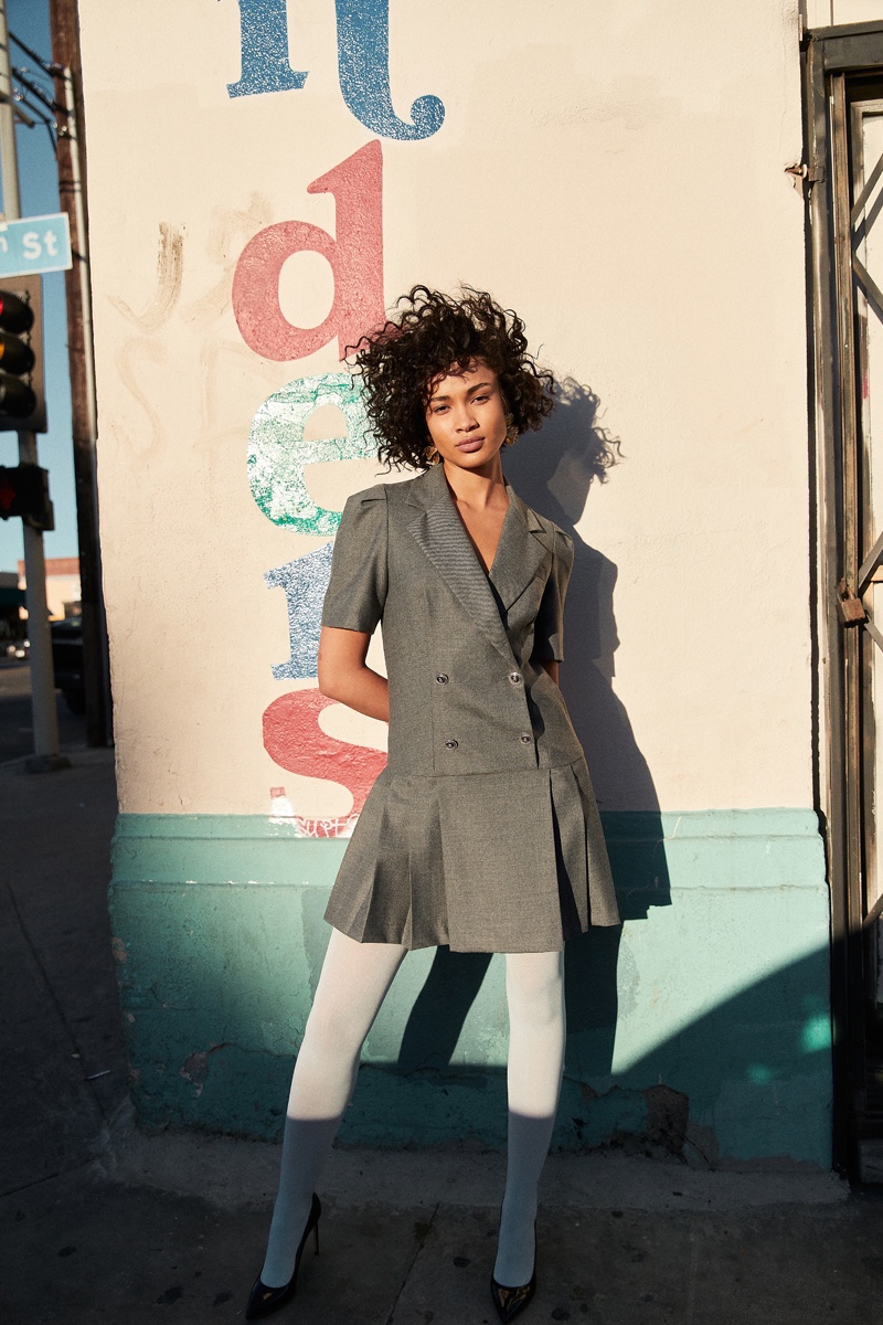 Cydney Christine wears Dress Sandro, Tights Wolford, Shoes Francesco Russo & Earrings Zara. Photo: Alexander Ting