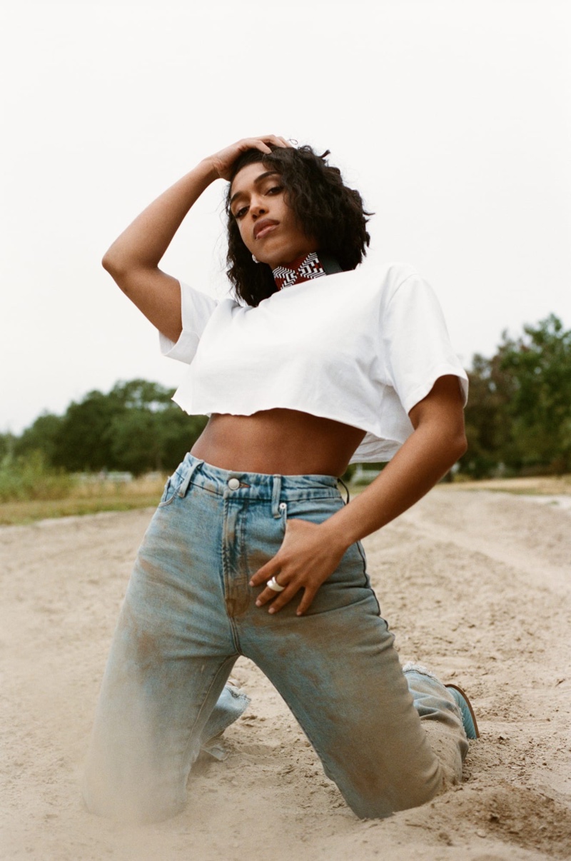 Lori Harvey stuns in a cropped shirt from Good American's summer 2023 line.