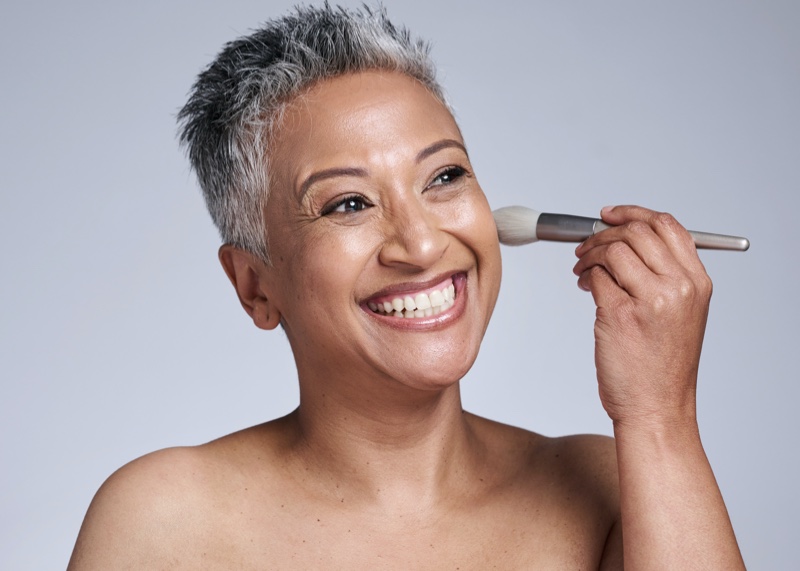 Mature Woman Applying Makeup