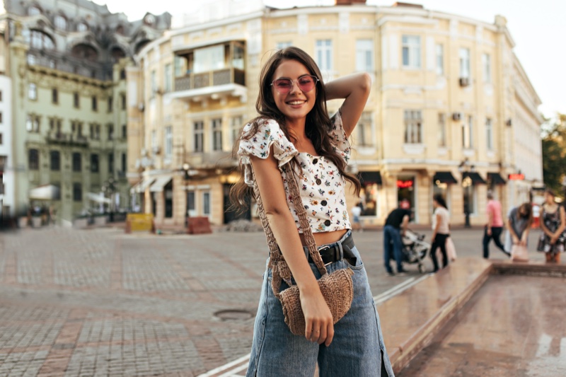 Hilary's casual look is complemented with a relaxed bright red LV