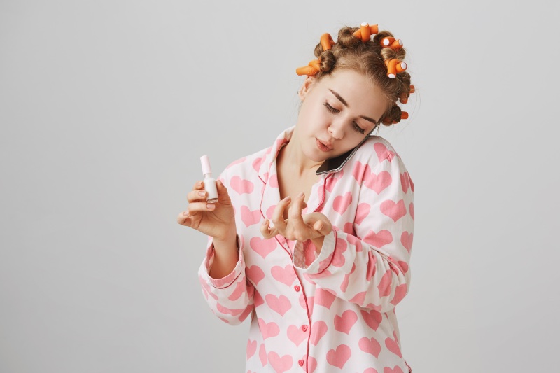 Woman Doing Nails at Home