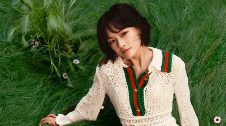 Dressed in white, Wen Qi poses in Gucci Ode to Love ad campaign.