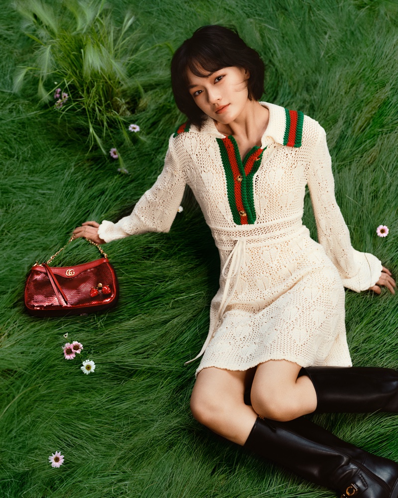 Dressed in white, Wen Qi poses in Gucci Ode to Love ad campaign.