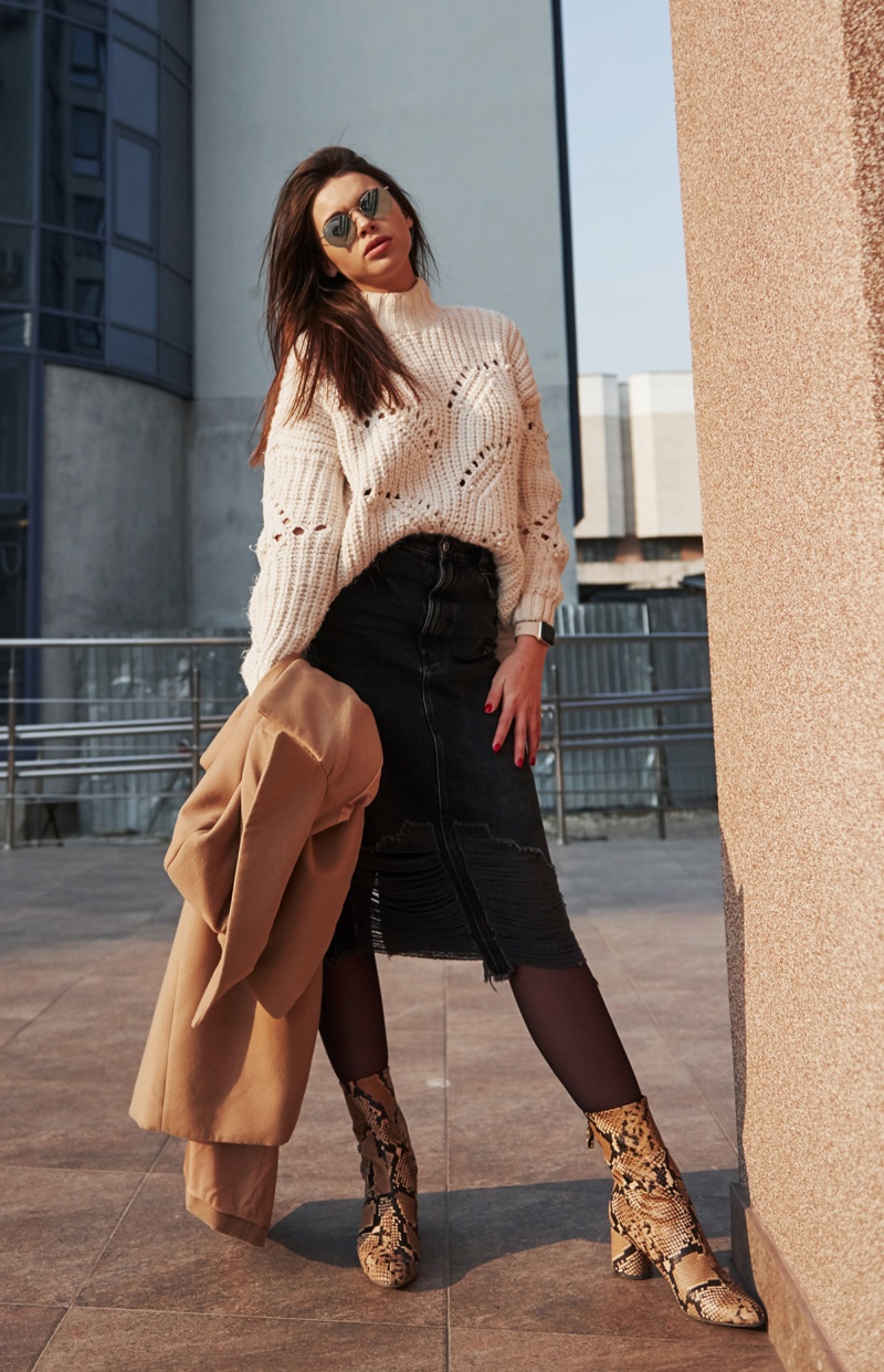 White Sweater Dark Denim Skirt Snakeskin Boots Neutral Outfit