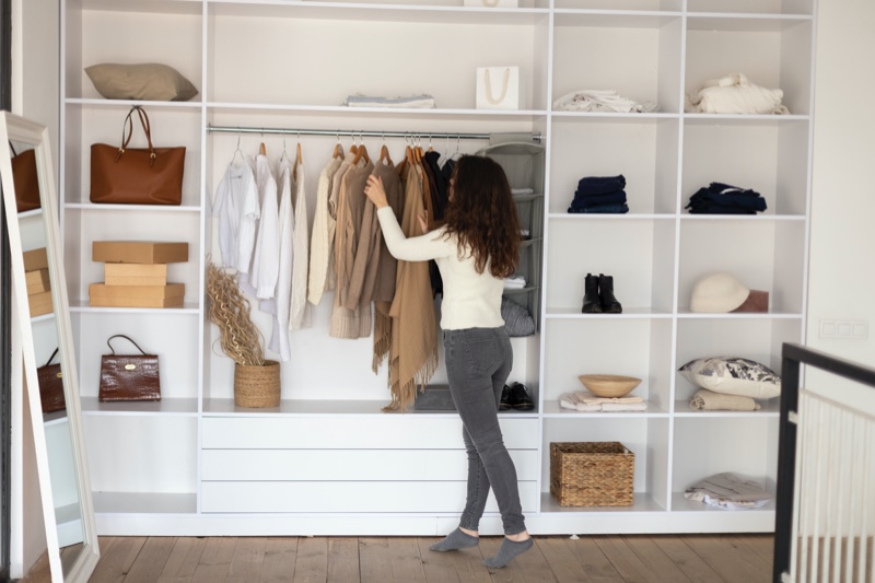 Woman Checking Work Capsule Wardrobe