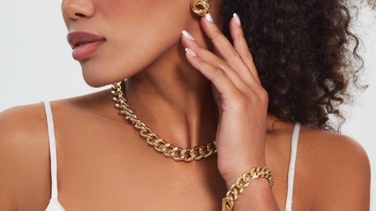 Woman Wearing Gold Jewelry