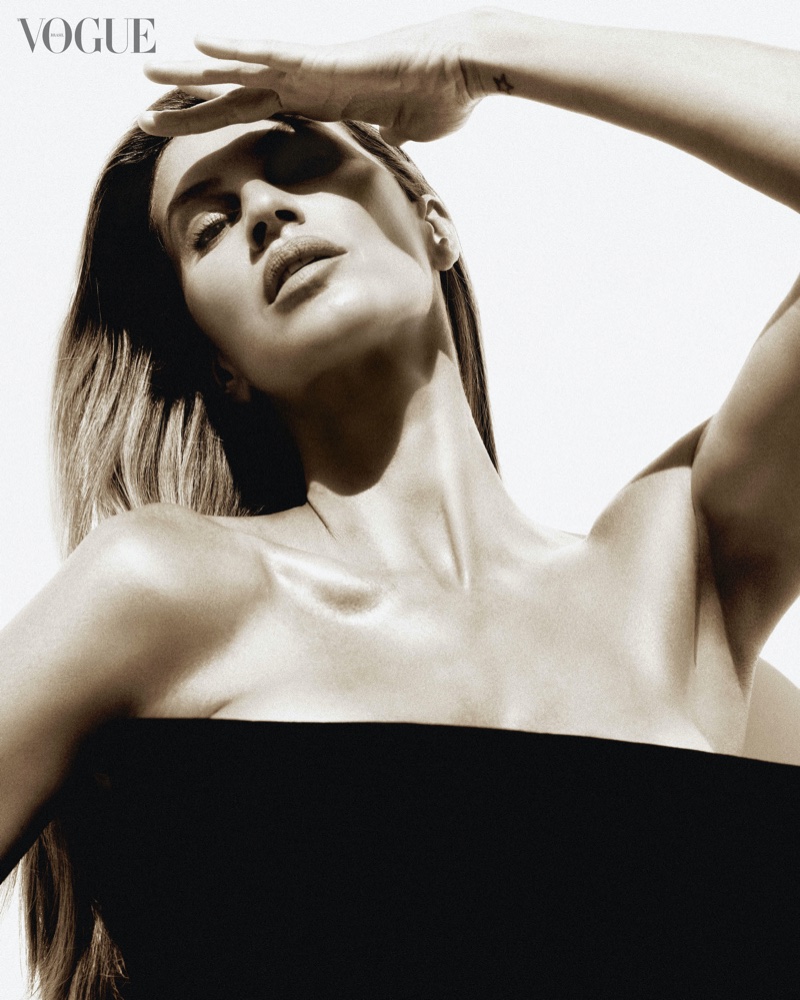 Gisele Bundchen strikes a pose in Louis Vuitton for Vogue Brazil.