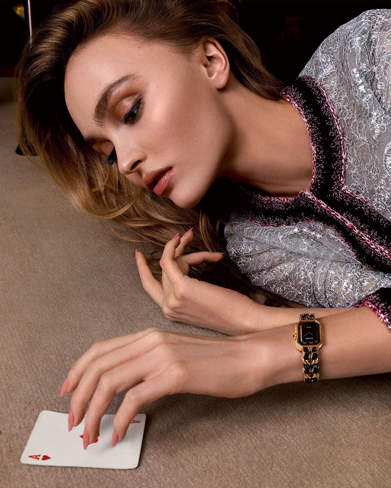 Lily-Rose Depp's hands tell a story, and her Chanel watch is the narrator. 