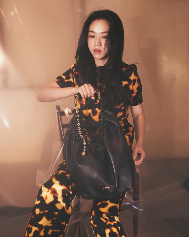 Tang Wei models bold prints from the fall collection of Loewe.