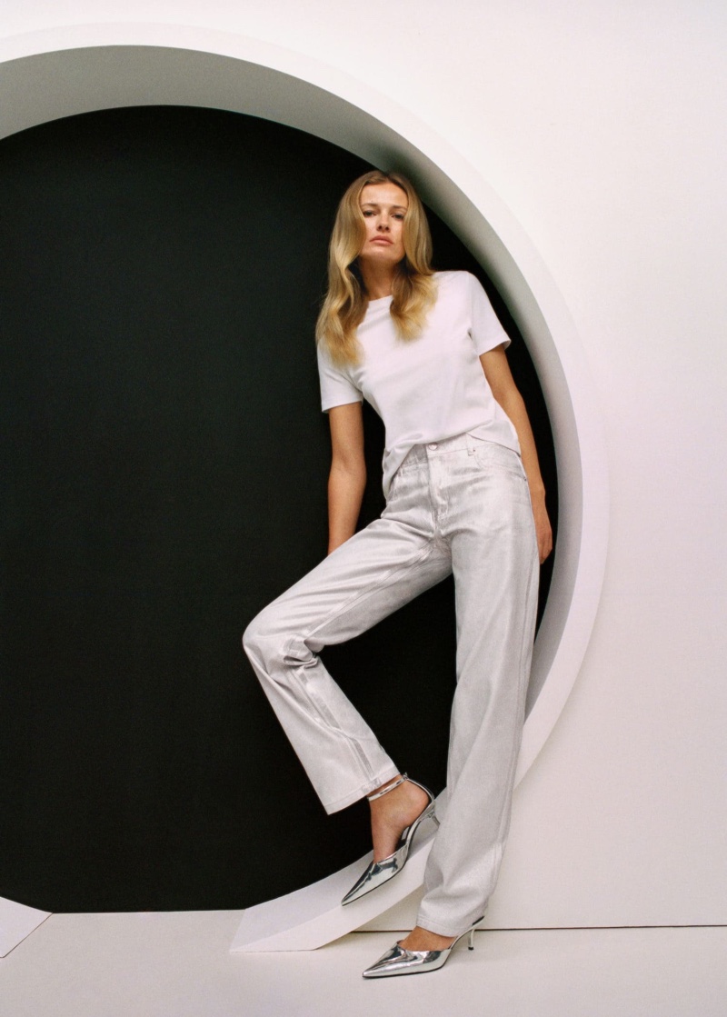 Edita Vilkeviciute models Mango metallic straight-leg jeans.