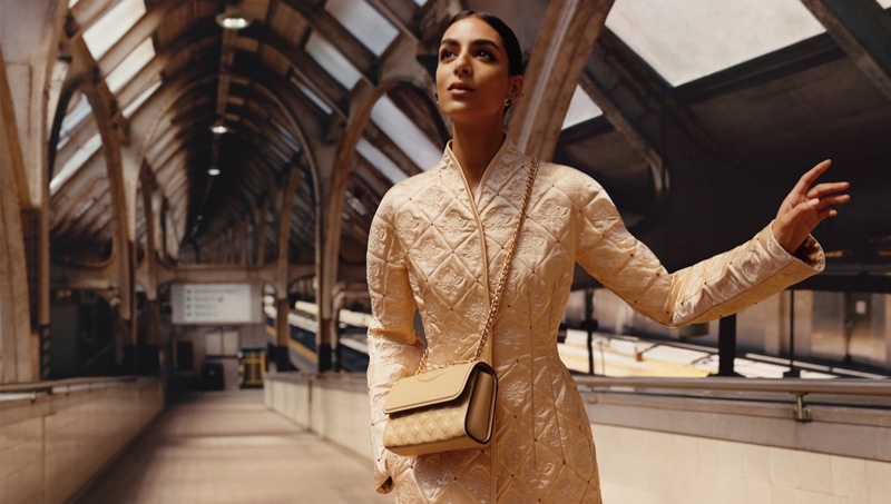 Nora Attal poses with Fleming quilted shoulder bag for Tory Burch fall-winter 2023 campaign.