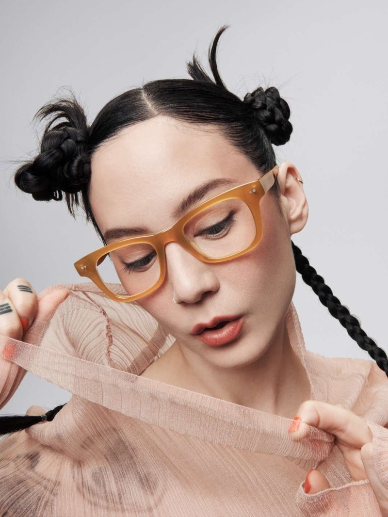 Michelle Zauner shows off Warby Parker's Freddy Glasses in Apricot.