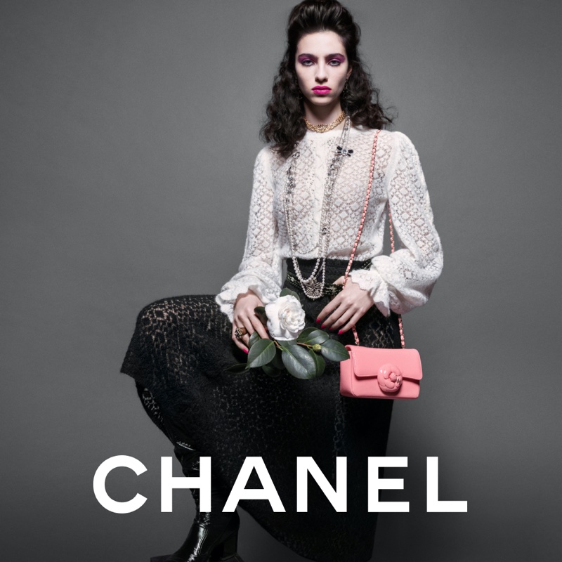 Loli Bahia models a lace top and skirt in Chanel fall 2023 campaign.