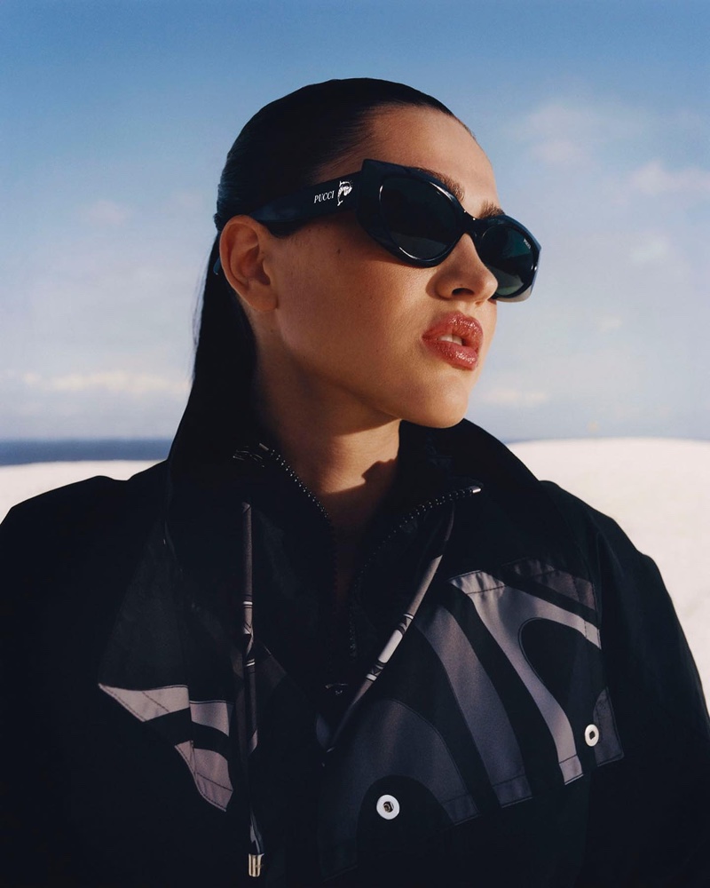 Amelia Gray wears sunglasses in Emilio Pucci Supernova fall 2023 campaign.