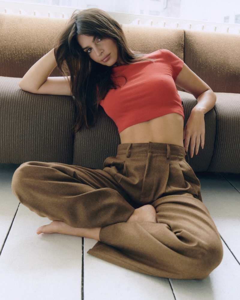 Emily Ratajkowski wears a crop top with wide-leg jeans from her AG collaboration.