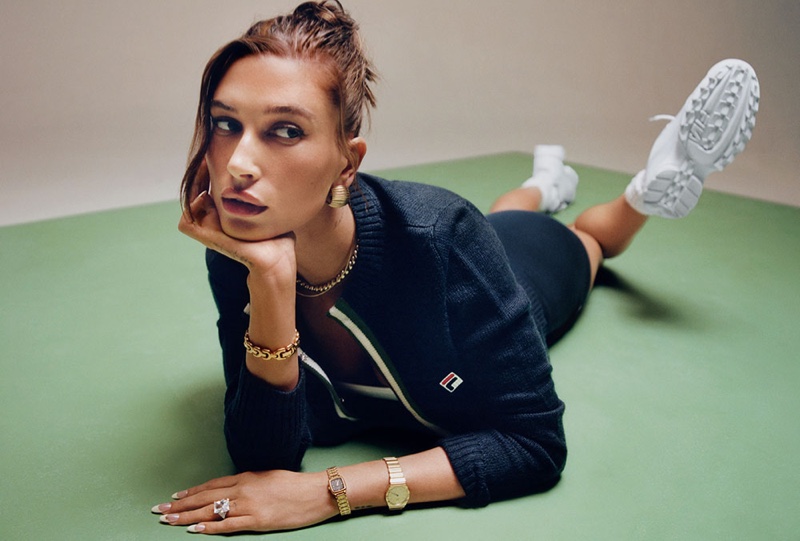 Paired with jewelry, Hailey channels the tennis court for the FILA ad campaign.