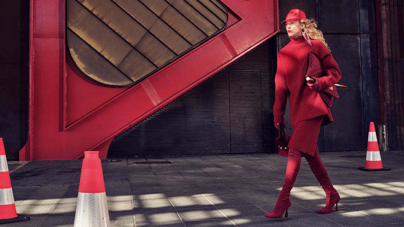 Hermès features an all-red look in its fall-winter 2023 campaign. 