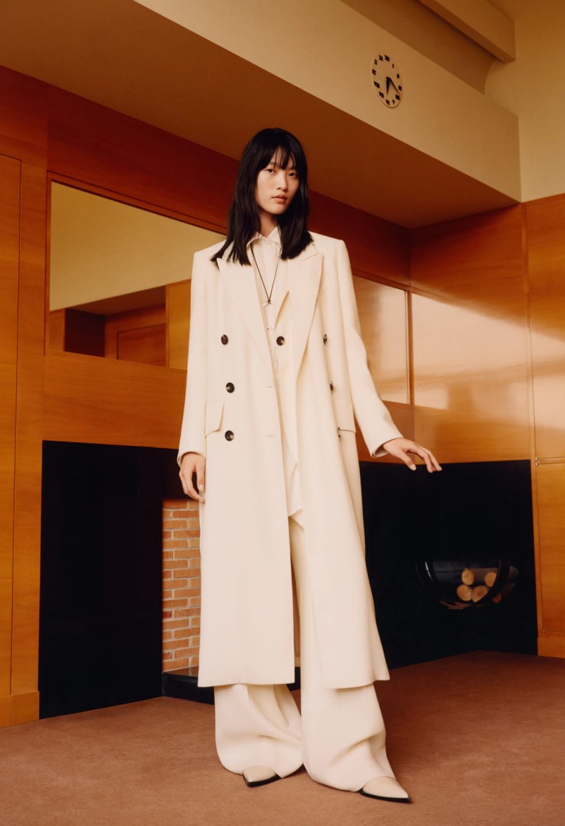 Ji Shun models double-breasted coat from Massimo Dutti Limited Edition fall 2023 collection.
