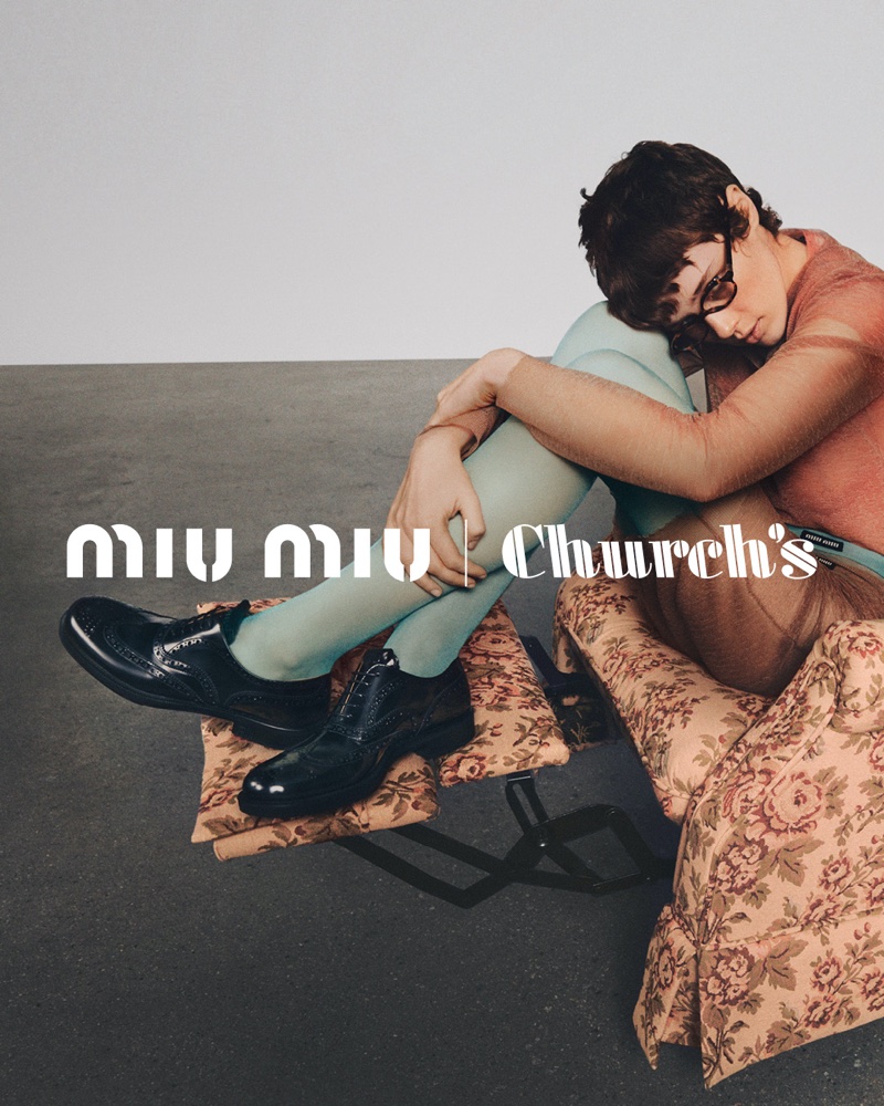 Annabelle Weatherly poses in Miu Miu's collaboration with Church's for fall-winter 2023.