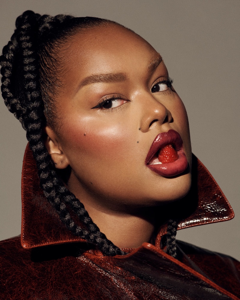 Precious Lee wears Rhode Peptide Lip Tint in Raspberry Jelly.