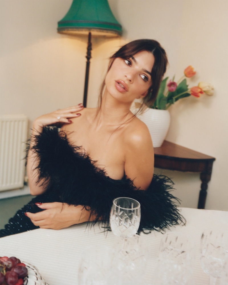 Emily Ratajkowski poses in a little black dress from Self-Portrait's eveningwear collection.