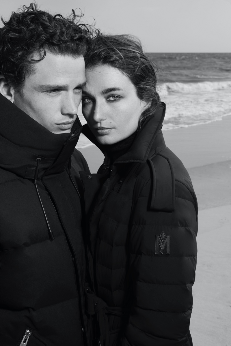 Model couple Simon Nessman and Andrea Diaconu front Mackage fall 2023 campaign.