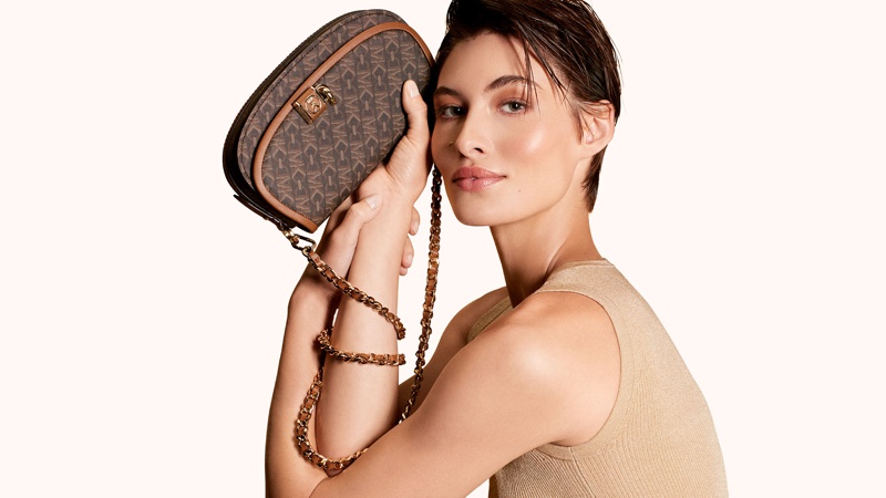 Grace Elizabeth fronts Michael Kors Empire Signature Logo campaign for fall 2023.