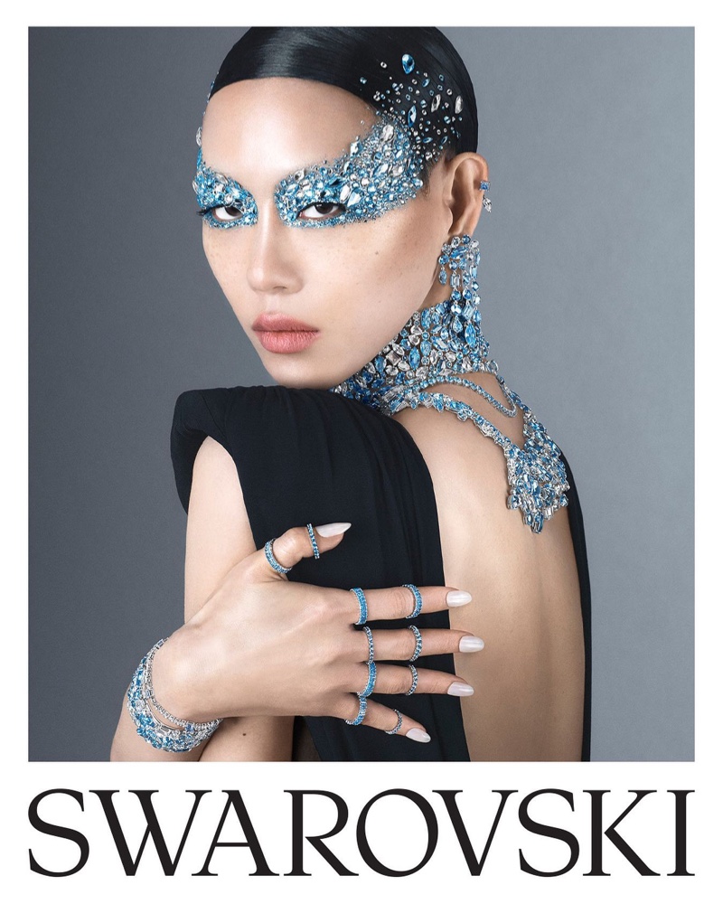 Sora Choi strikes a pose in the Swarovski holiday 2023 advertising campaign.
