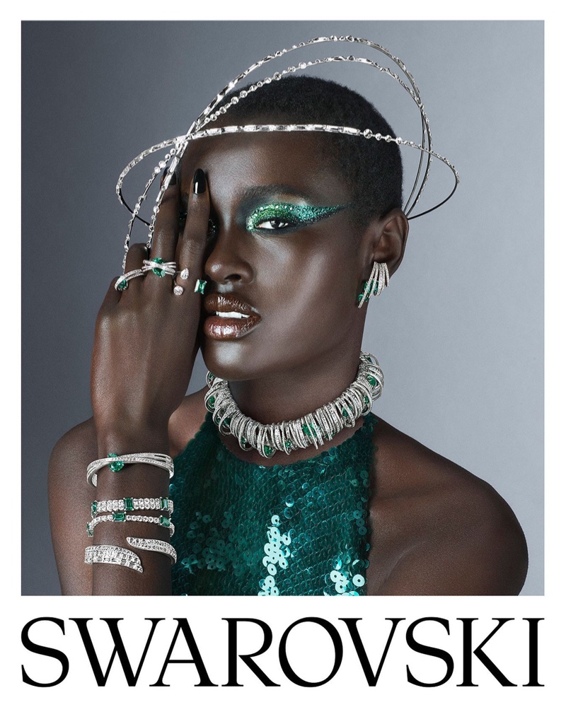 Nyawurh Chuol gets festive in green for Swarovski's holiday campaign.