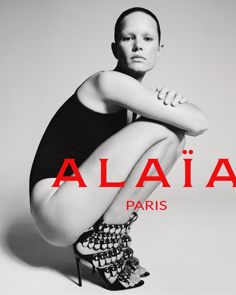Sleek simplicity meets modern edge as Anna Ewers wears bodysuit and embellished heels in the Alaïa spring 2024 campaign.