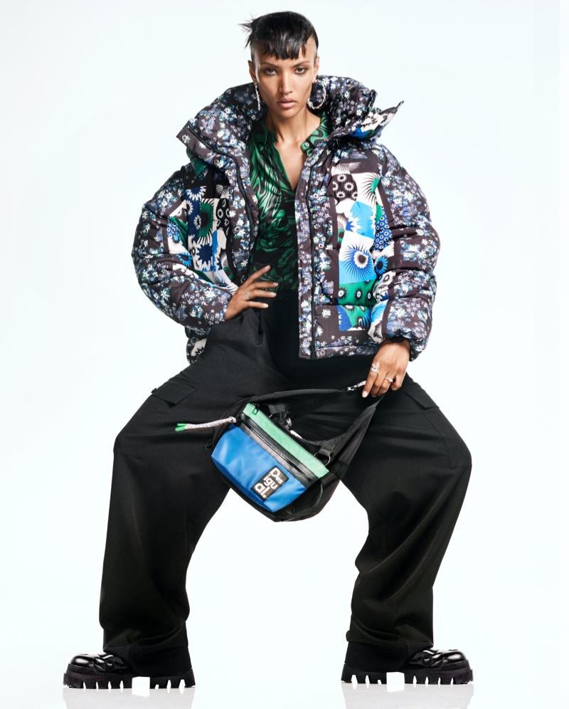 Georgia Palmer models a puffer jacket with wide-leg pants from Desigual for the fall 2023 collection.