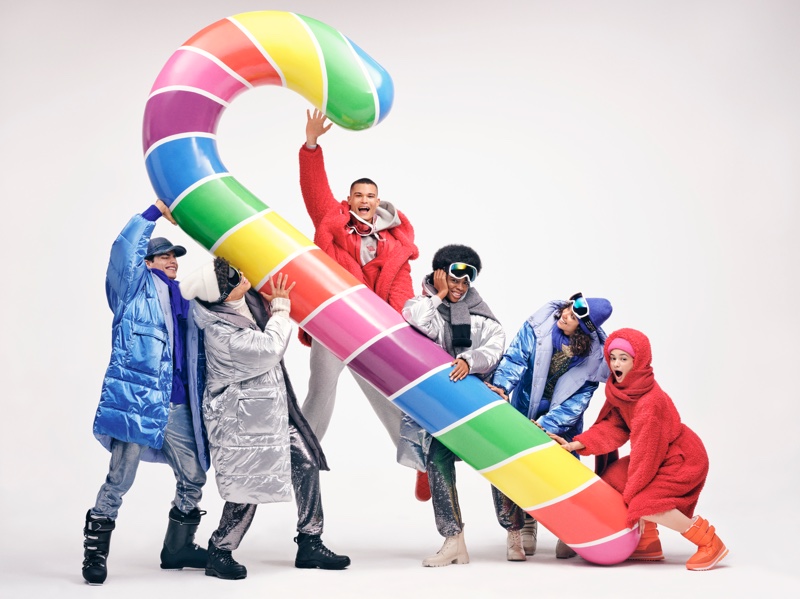 A rainbow candy cane brings festive vibes to Esprit's holiday campaign.