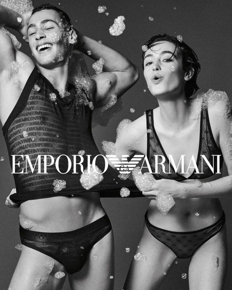 A duo of delight: models Kim Schell and Barak Shamir pose with bubbles in Emporio Armani Underwear's fall designs.