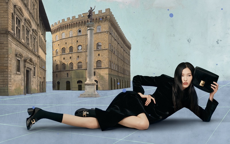 Ying Ouyang poses in luxe black velvet dress for Ferragamo's holiday 2023 campaign.