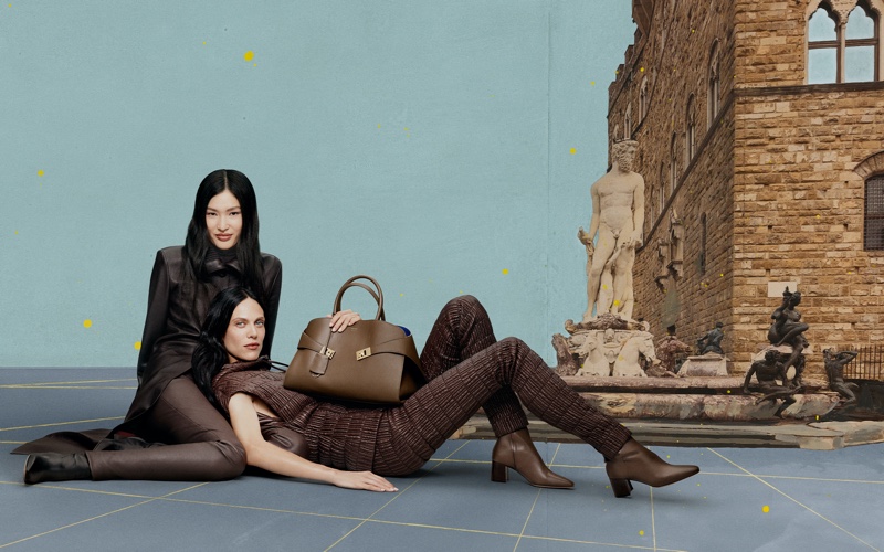 A duo draped in Ferragamo's holiday finery, echoing the legacy of Florentine artistry.