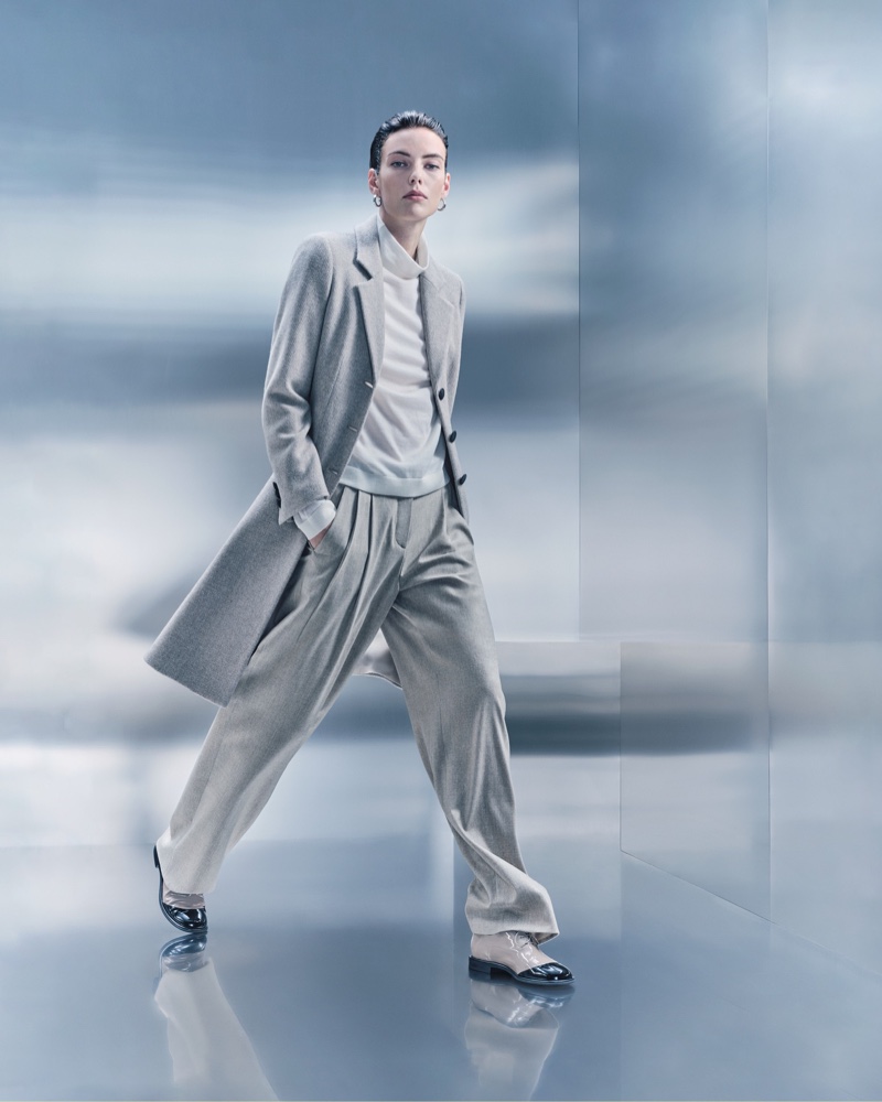 Giorgio Armani features a grey outfit with a coat, sweater, and high-waisted pants for its Made to Measure campaign.
