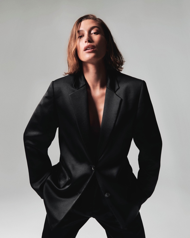 Calvin Klein features a polished blazer look for its holiday campaign with Hailey Bieber.
