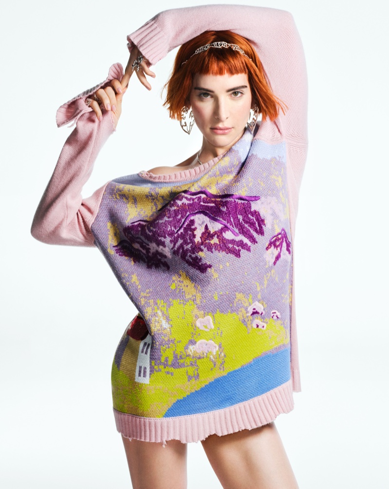 Barbie star Hari Nef models pink sweater for Desigual's fall-winter 2023 campaign.